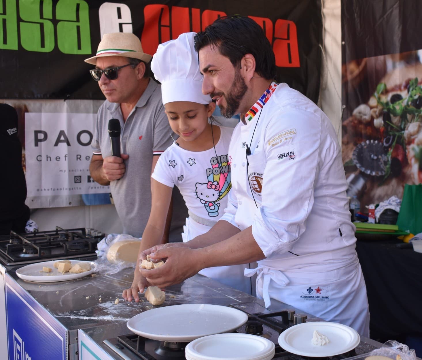 PAOLO GATTO AND HIS DAUGHTER DURING A FOOD SHOW